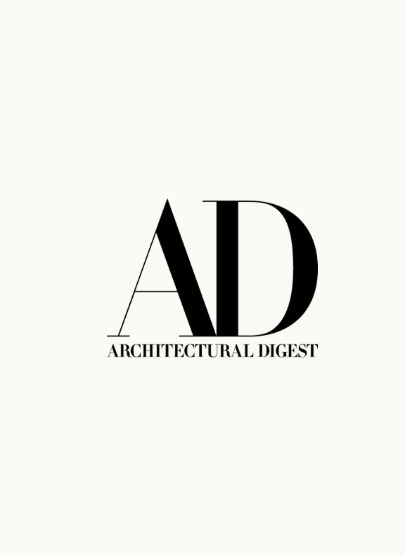 The logo for Architectural Digest, featuring a large stylized 'AD' in black serif type with the words 'ARCHITECTURAL DIGEST' underneath, centered on a solid off-white background.